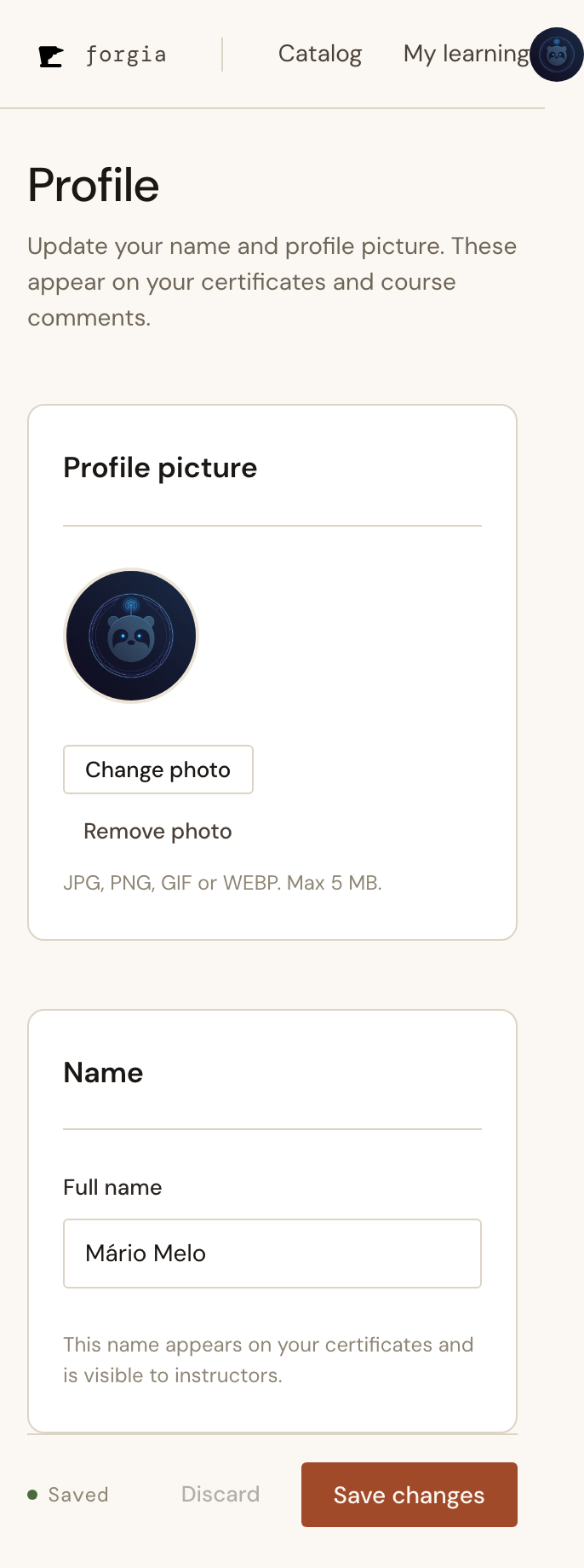 The profile page at 320px width