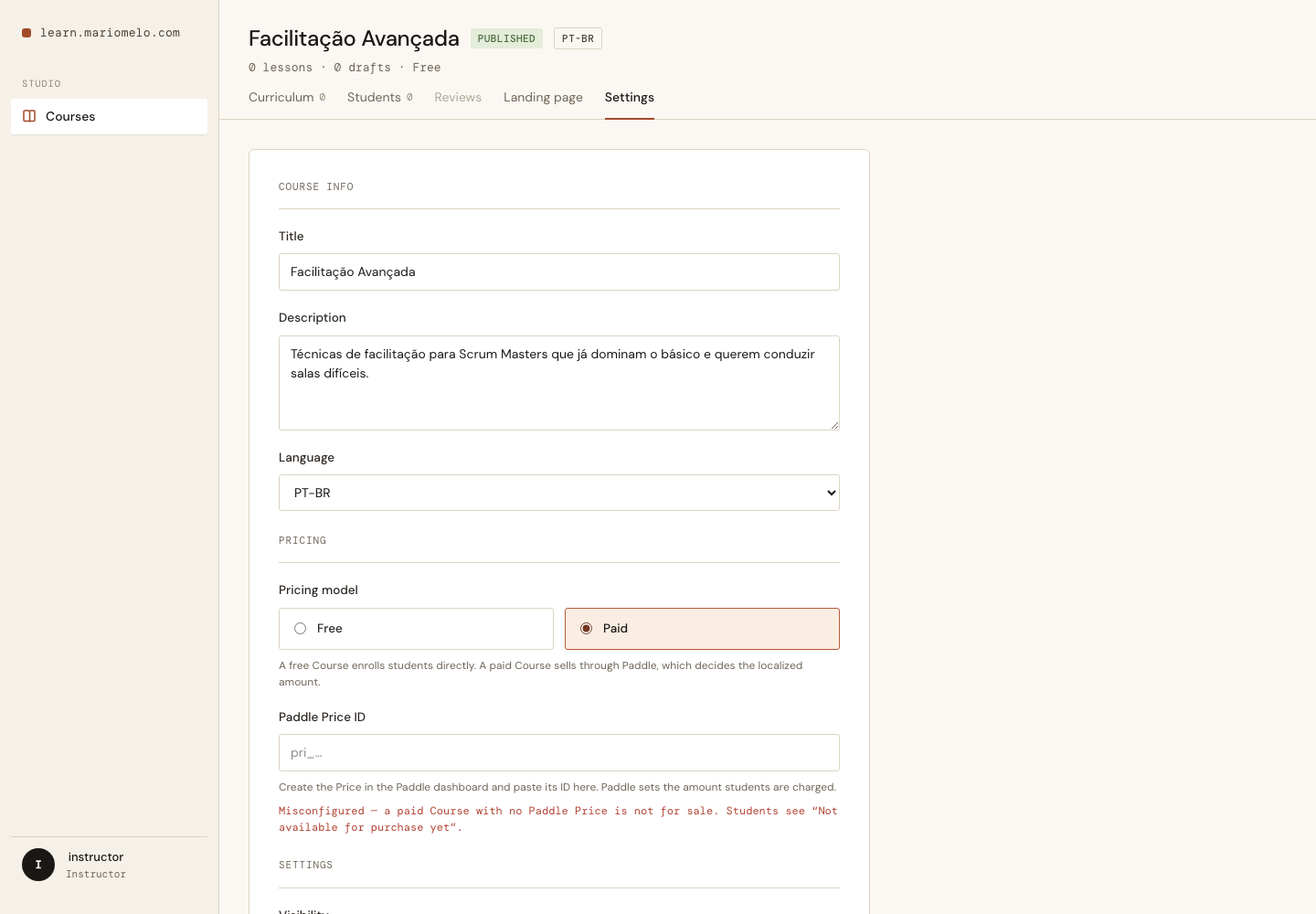 The Settings tab: a paid Course with no Paddle Price ID, flagged as misconfigured